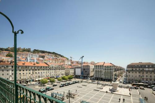 a view of a city with a plaza and buildings at The Visionaire Apartments in Lisbon