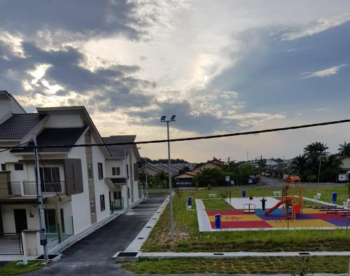 a park with a playground in a residential neighborhood at MY Homestay KLIA in Sepang