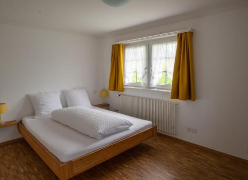 Postel nebo postele na pokoji v ubytování Ferienhotel Idyll Gais