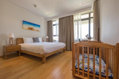 Giường trong phòng chung tại Luxury Apartment - Ocean Villas Resort