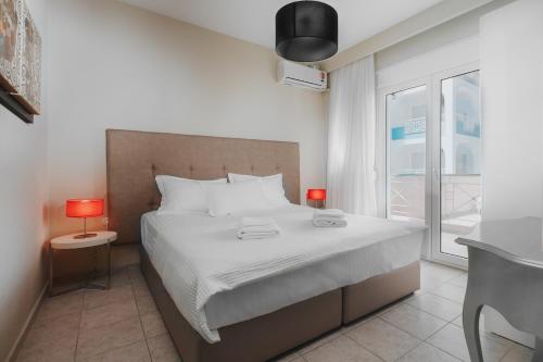 Postel nebo postele na pokoji v ubytování Inside Apartments