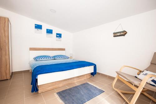 Posteľ alebo postele v izbe v ubytovaní Apartments Aria
