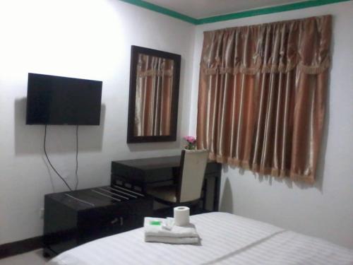 Letto o letti in una camera di Asia Novo Boutique Hotel - Roxas