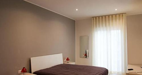 Matera Sassi Rooms 21/a e 21/bにあるベッド