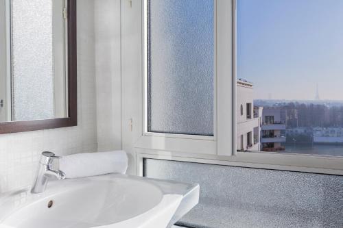 Koupelna v ubytování Best Western Rives de Paris La Defense