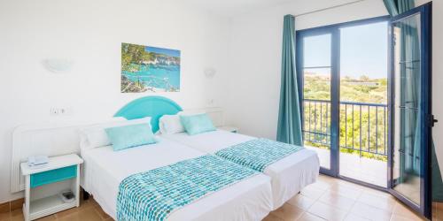 Postel nebo postele na pokoji v ubytování Bimbolla Apartaments