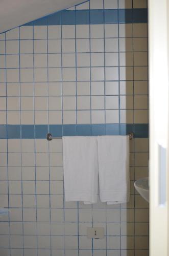 Koupelna v ubytování Hotel Serenella