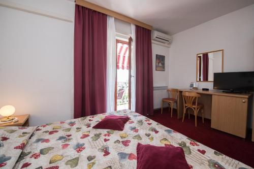 Posteľ alebo postele v izbe v ubytovaní Bed & Breakfast Villa Klara