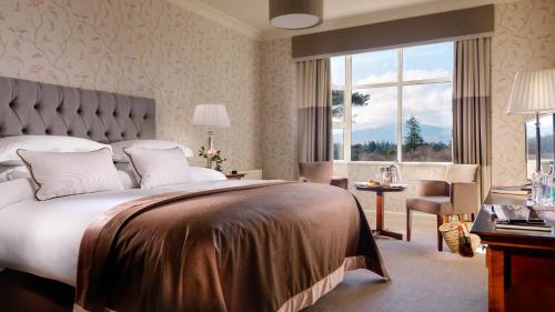 Voodi või voodid majutusasutuse Parknasilla Resort & Spa toas