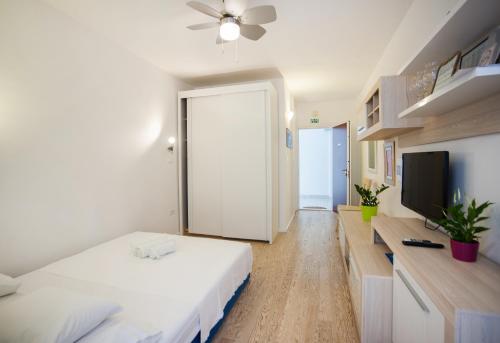Posteľ alebo postele v izbe v ubytovaní Asa Studio Apartment
