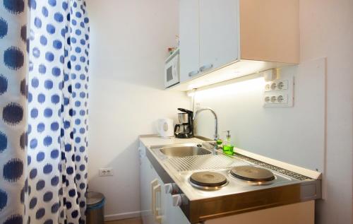 Kuchyňa alebo kuchynka v ubytovaní Asa Studio Apartment