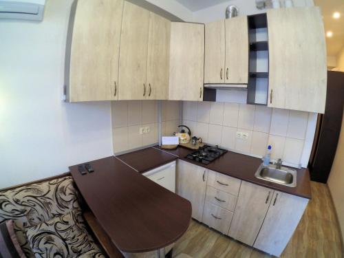 Una cocina o kitchenette en Apartment on Sanatornaya