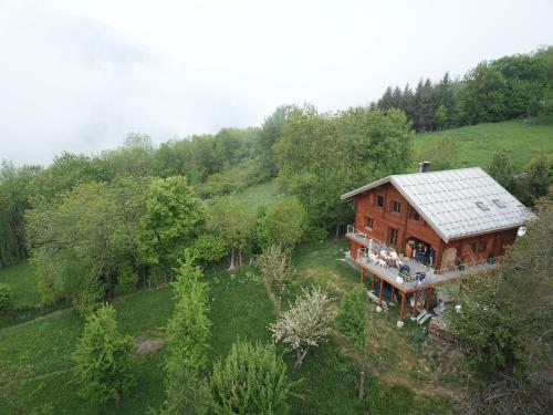an overhead view of a house in the woods at Chambre d'Hôtes Barnabas in Saint-Martin-de-la-Porte