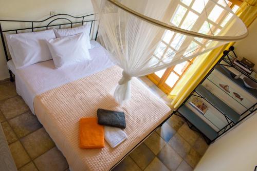 Ein Bett oder Betten in einem Zimmer der Unterkunft Marianna Cottage