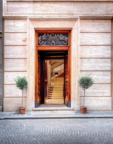 Η πρόσοψη ή η είσοδος του Singer Palace Hotel Roma