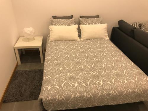 Tempat tidur dalam kamar di Villa ilha das 7 Bicas