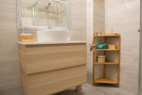 Een badkamer bij Oasis Alicante