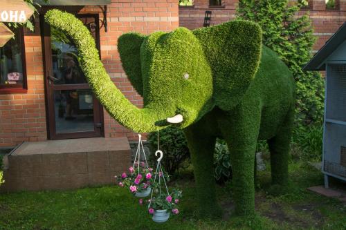 a statue of an elephant with a swing at Фортеця in Kyiv