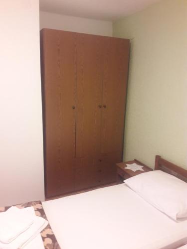 Postel nebo postele na pokoji v ubytování Roza Guest House