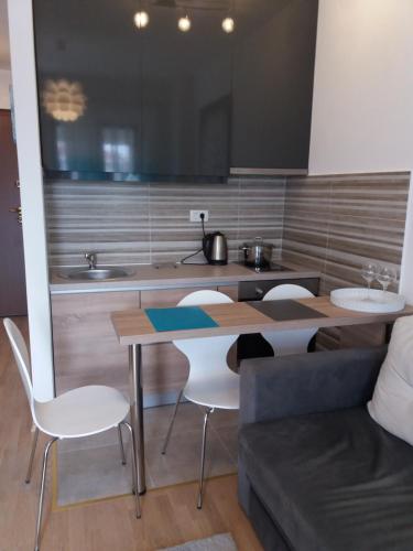 Posezení v ubytování Apolonia Lux Apartment