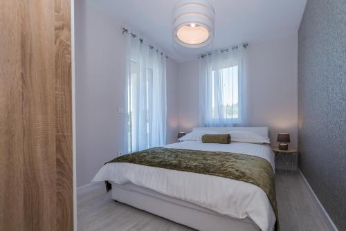 Posteľ alebo postele v izbe v ubytovaní Villa Franica