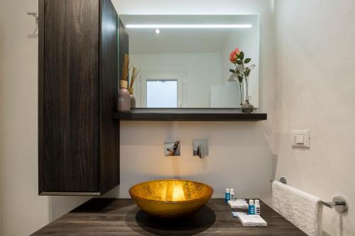 Ванна кімната в Silver Novella Luxury Apartment - Centro Storico