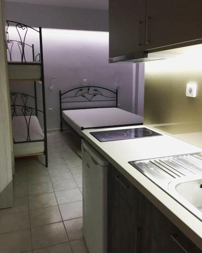 Kuchyň nebo kuchyňský kout v ubytování Eva Rooms