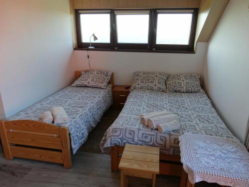 Postel nebo postele na pokoji v ubytování u Skiby