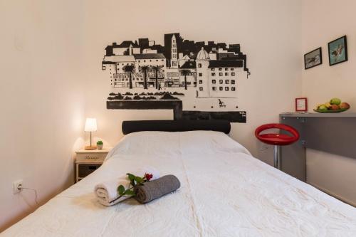 Posteľ alebo postele v izbe v ubytovaní Guest House Beach & City