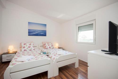 Photo de la galerie de l'établissement Apartmani Luka, à Vir