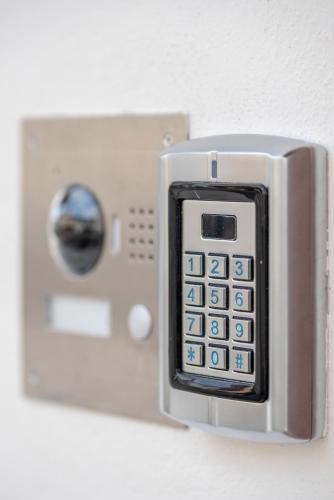 a remote control is attached to a microwave oven at Casa Ercoli B&B in Vinci