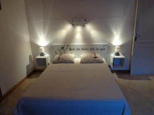 Tempat tidur dalam kamar di La Tina, Les Faïsses & La Besses