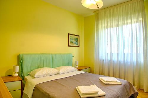 Cama ou camas em um quarto em Apartments Medena