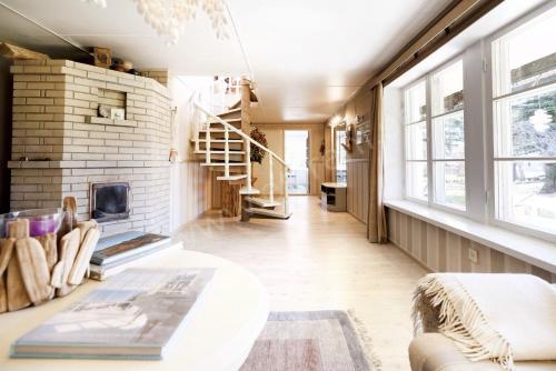 Ένα ή περισσότερα κρεβάτια σε δωμάτιο στο Kaju Guesthouses