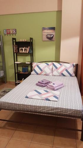 Ένα ή περισσότερα κρεβάτια σε δωμάτιο στο Cozy Loft