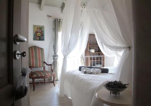 Giường trong phòng chung tại Il Borgo Delle Grazie