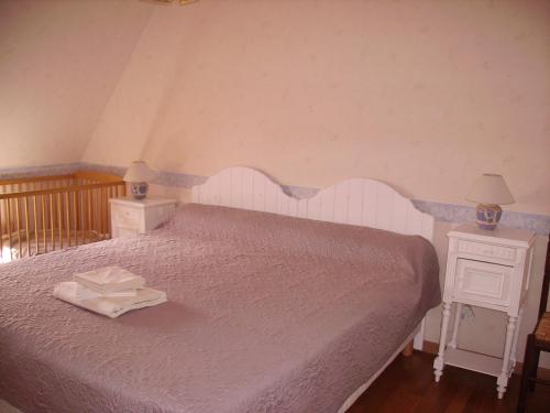 En eller flere senge i et værelse på La Plaine de Baillard