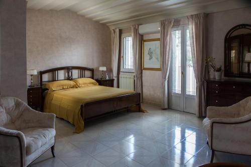 En eller flere senge i et værelse på Vdl Luxury Villa