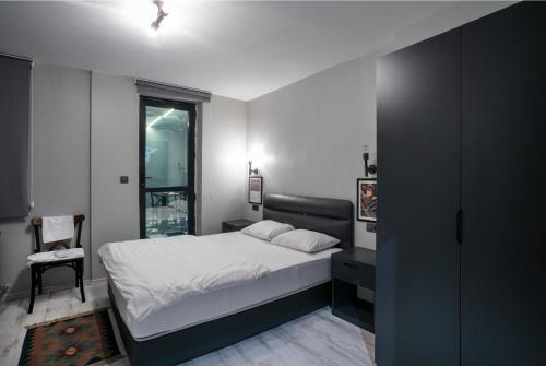 מיטה או מיטות בחדר ב-Hanchi Hostel