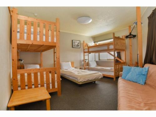 Postel nebo postele na pokoji v ubytování Black Diamond Lodge