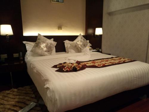 Cama o camas de una habitación en Sherar Addis Hotel