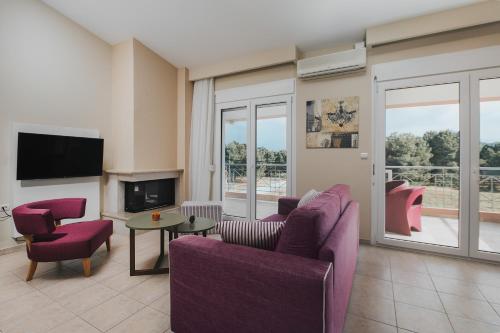 TV a/nebo společenská místnost v ubytování Inside Apartments