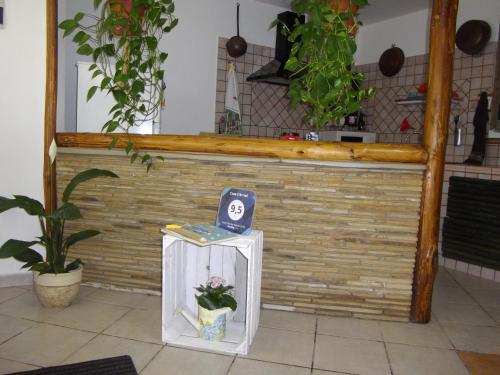 a table with a timer on it in a kitchen at Casa S'Arriali in Iglesias
