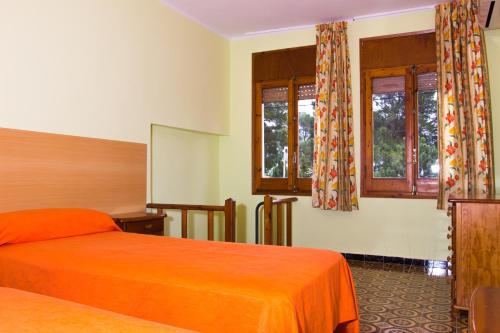 Llit o llits en una habitació de Rentalmar Villa Cristina Families Only