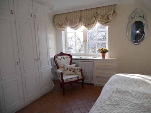 Ένα ή περισσότερα κρεβάτια σε δωμάτιο στο Biberhues-OG