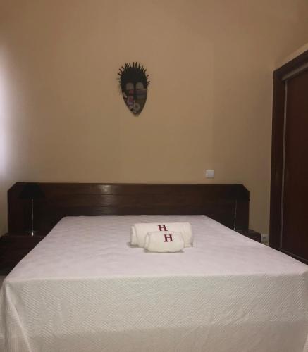 Ένα ή περισσότερα κρεβάτια σε δωμάτιο στο Hotel Central