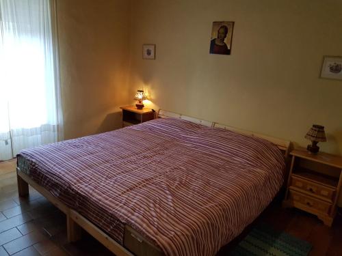 Ένα ή περισσότερα κρεβάτια σε δωμάτιο στο Agriturismo Podere Omomorto