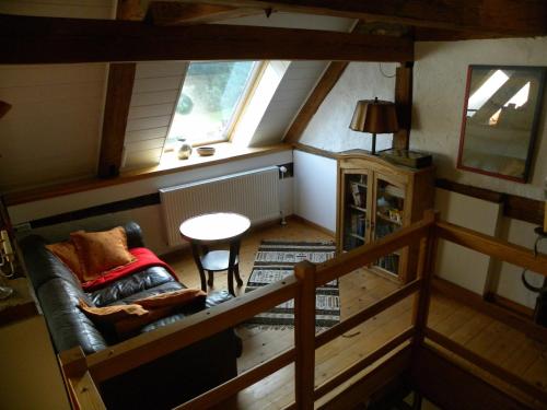 Posezení v ubytování Historisches Küsterhaus Reetdachträume