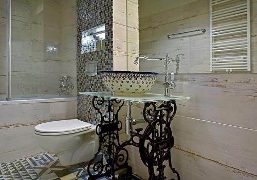 Kylpyhuone majoituspaikassa Dali Aparthotel