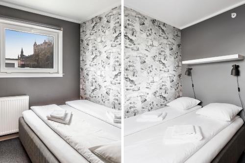 Postel nebo postele na pokoji v ubytování Rygerfjord Hotel & Hostel